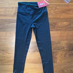 Cotopaxi Black Leggings with Teal Trim